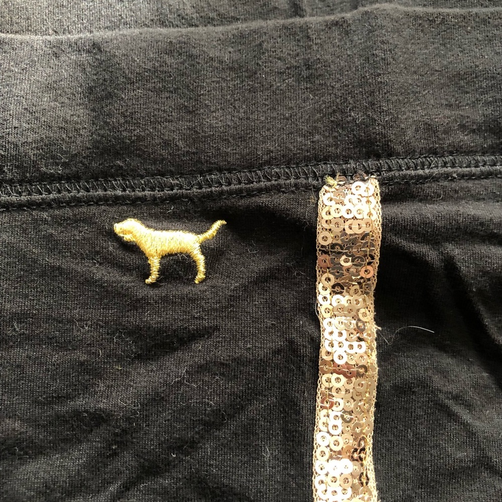 PINK black cotton legging. Gold sequins down the side. Size Small.